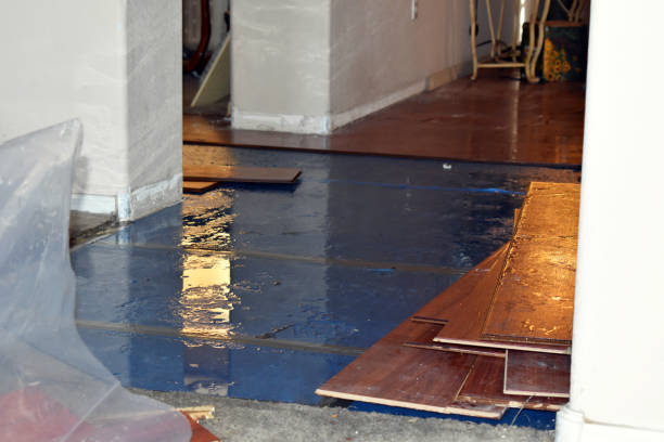 Professional Flood Cleanup technician working in West Sand Lake, NY